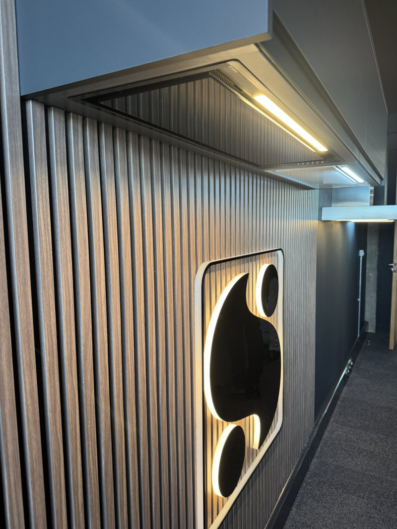 Georgie, panelled with wooden front panel, like the kitchen